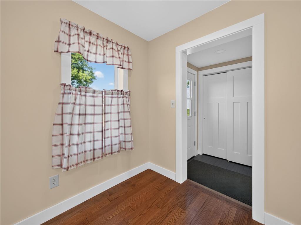 291 East Dannersville Road Bath, PA 18014 - Photo 35 of 46 Rich hardwood flooring extends into a welcoming entryway featuring clean white trim and abundant natural light.