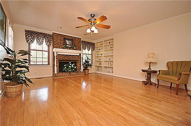 4019 Arno Road Franklin, TN 37064 - Photo 4 of 12 a living room with furniture and a fireplace