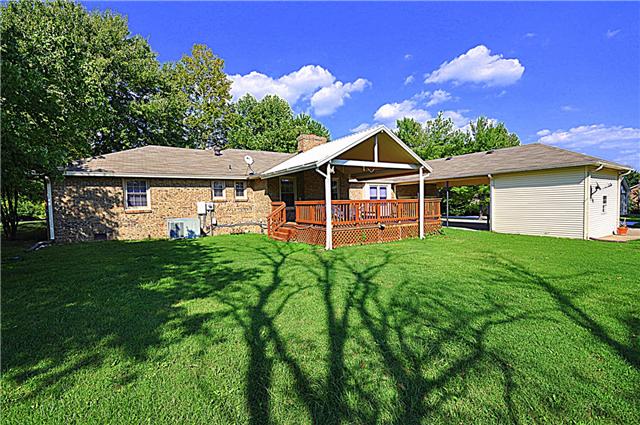 4019 Arno Road Franklin, TN 37064 - Photo 9 of 12 a view of a house with a backyard porch and sitting area