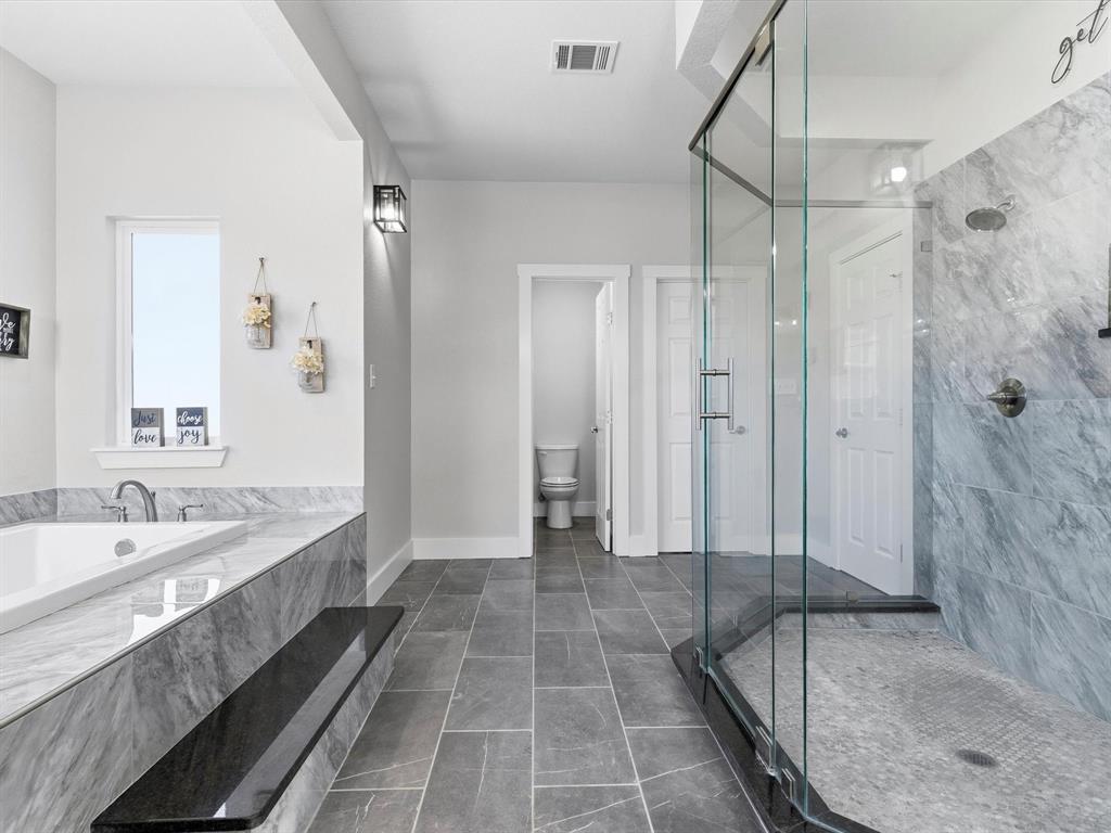 123 Kriston Lane Springtown, TX 76082 - Photo 24 of 39 a bathroom with a tub shower and sink