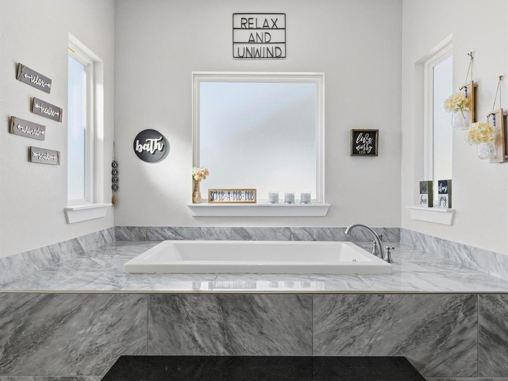 123 Kriston Lane Springtown, TX 76082 - Photo 26 of 39 a bathroom with a granite countertop sink and a mirror