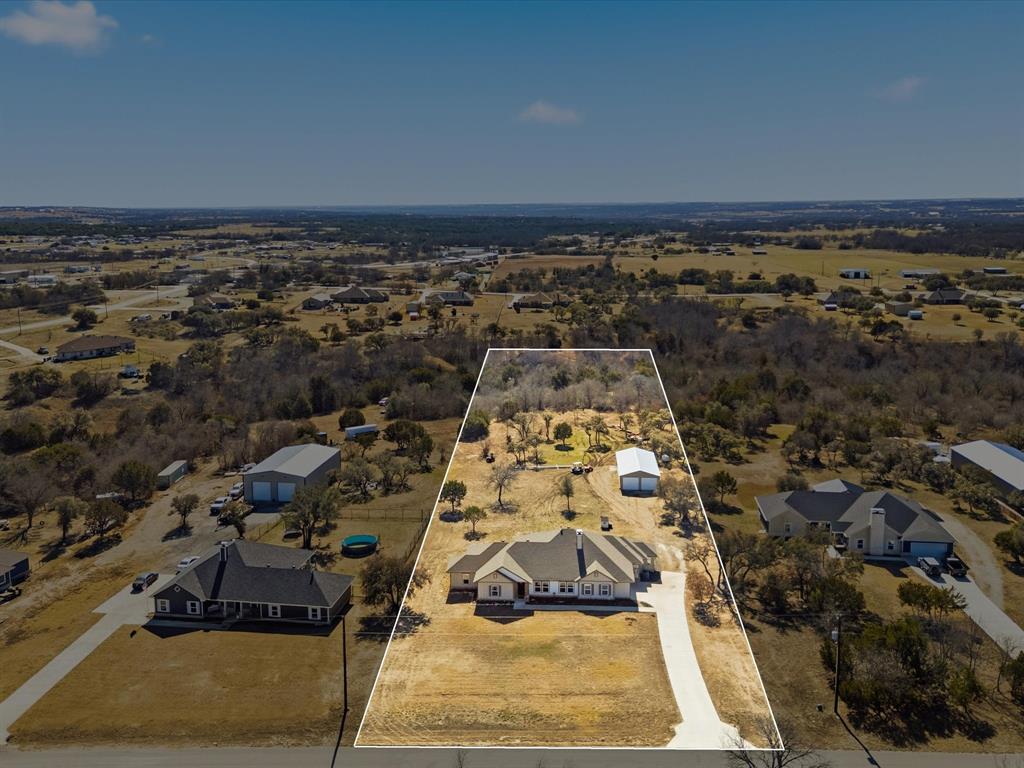 123 Kriston Lane Springtown, TX 76082 - Photo 32 of 39 an aerial view of a yard