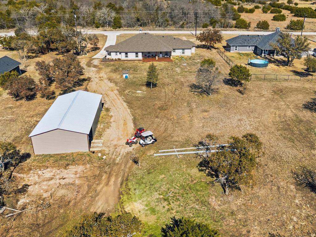 123 Kriston Lane Springtown, TX 76082 - Photo 36 of 39 an aerial view of residential houses with outdoor space