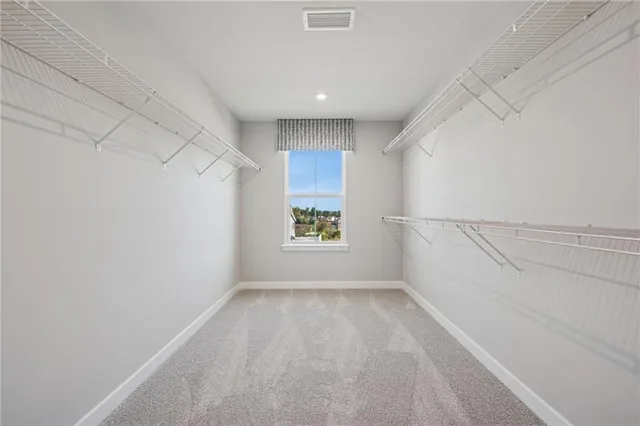 a view of room with window and hardwood floor