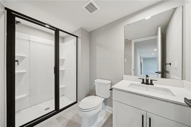 a view of a room with wooden walls and stairs