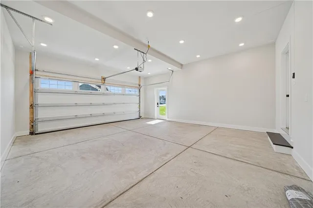 a view of an house with backyard and swimming pool