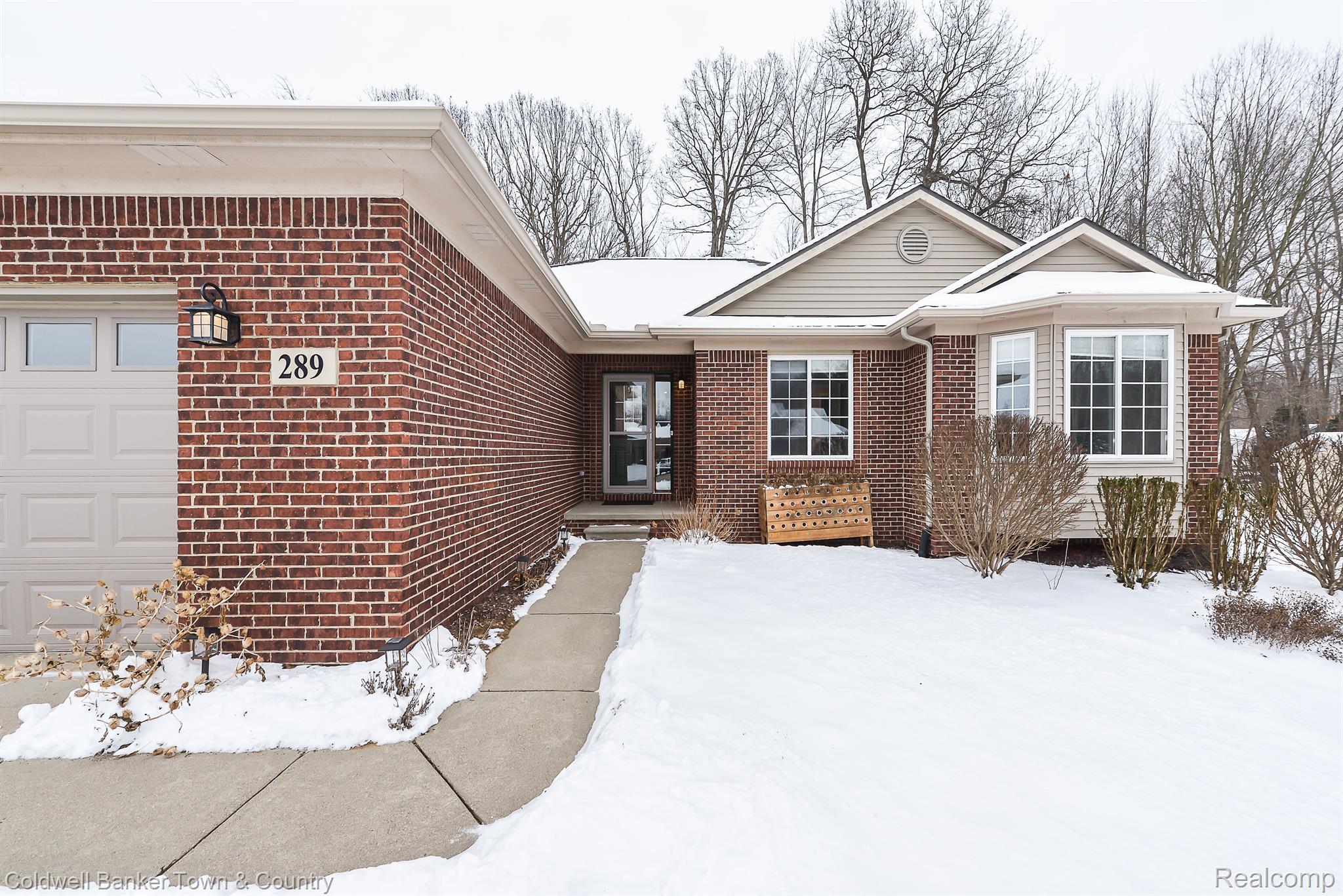 289 Crystal Howell, MI 48843 - Photo 8 of 41 Concrete walkway