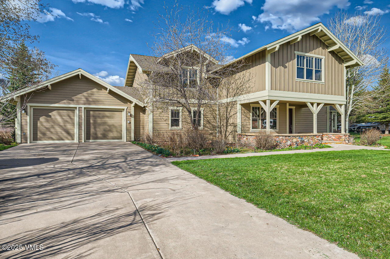 1987 Eagle Ranch Road Eagle, CO 81631 - Photo 2 of 37 a front view of a house with a yard