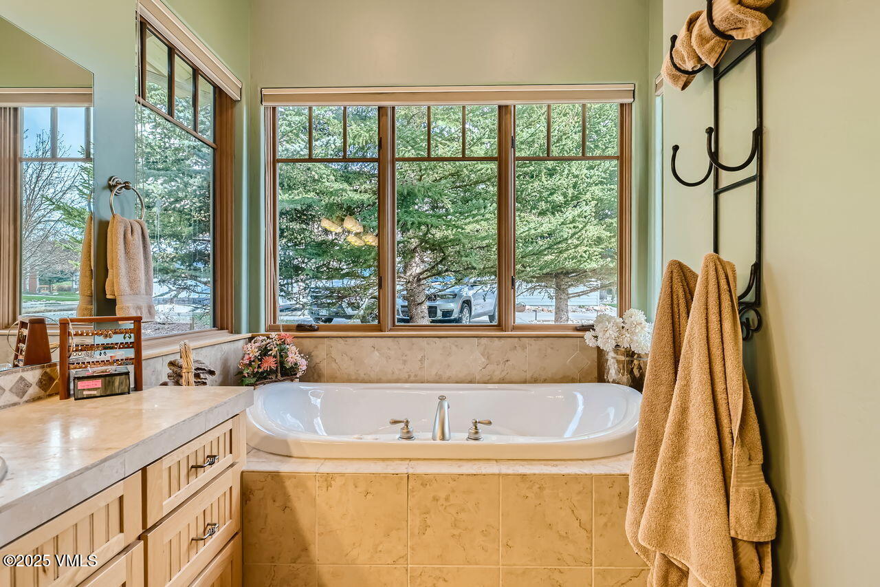 1987 Eagle Ranch Road Eagle, CO 81631 - Photo 22 of 37 a bath tub sitting next to a window