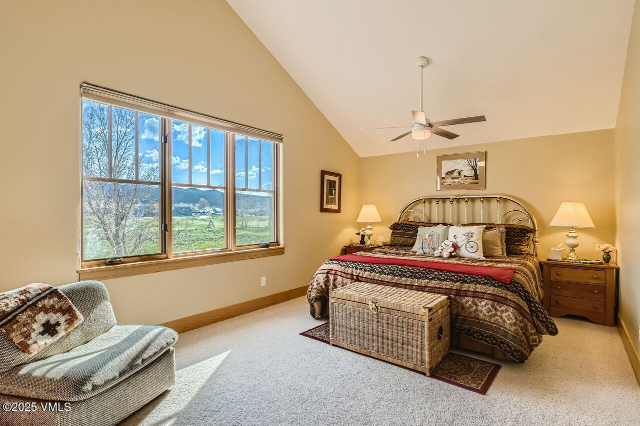 1987 Eagle Ranch Road Eagle, CO 81631 - Photo 24 of 37 a bedroom with a bed and window