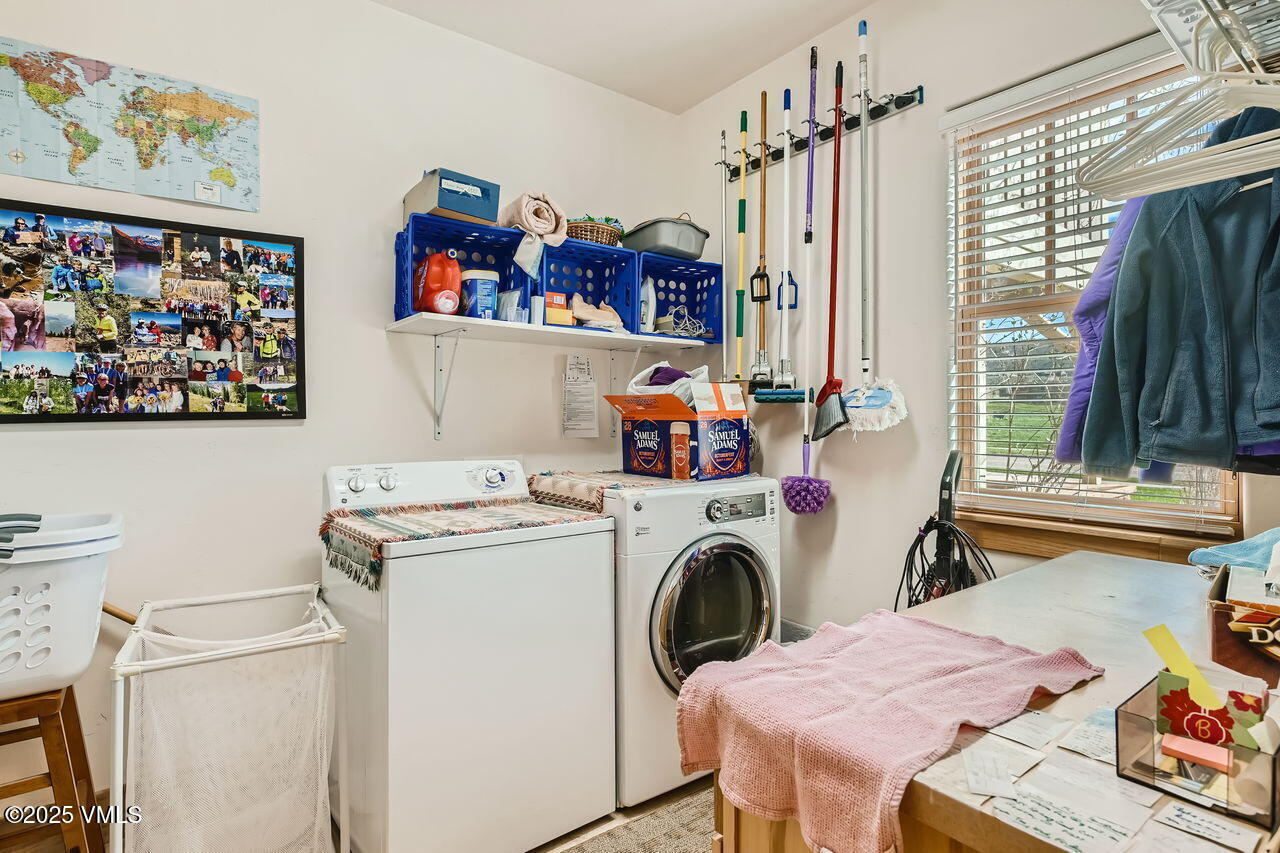 1987 Eagle Ranch Road Eagle, CO 81631 - Photo 31 of 37 a storage room with washer and dryer