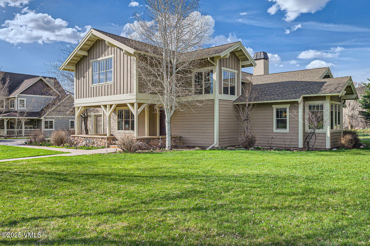 1987 Eagle Ranch Road Eagle, CO 81631 - Photo 5 of 37 a front view of a house with a garden