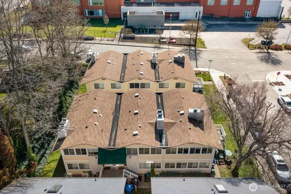 a aerial view of a house with a swimming pool