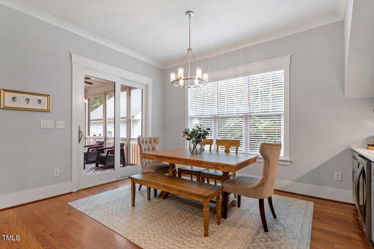 1215 Brookside Drive Raleigh, NC 27604 - Photo 15 of 34 a dining room with furniture and window