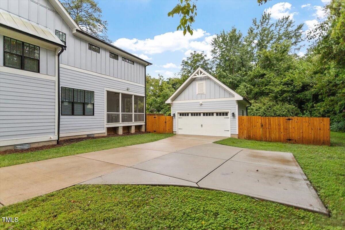 1215 Brookside Drive Raleigh, NC 27604 - Photo 3 of 34 a view of a house with a yard