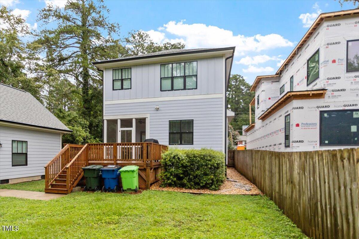 1215 Brookside Drive Raleigh, NC 27604 - Photo 32 of 34 a front view of a house with a yard table and chairs