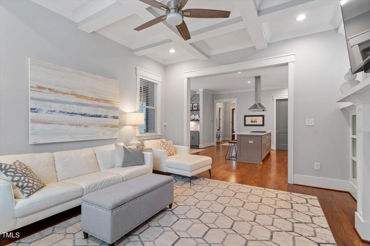 1215 Brookside Drive Raleigh, NC 27604 - Photo 7 of 34 a living room with furniture and a couch