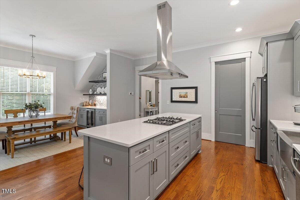 1215 Brookside Drive Raleigh, NC 27604 - Photo 10 of 34 a kitchen that has a lot of table and chairs in it