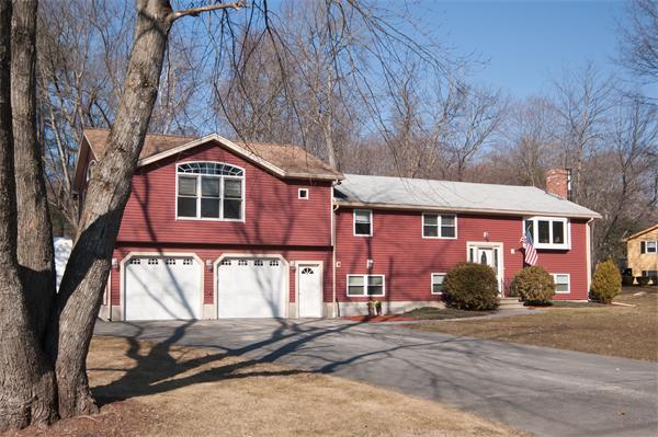 8 Michael Road Billerica, MA 01862 - Photo 1 of 10 a front view of a house with a yard