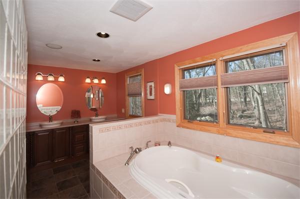 8 Michael Road Billerica, MA 01862 - Photo 6 of 10 a bathroom with a bathtub and a sink