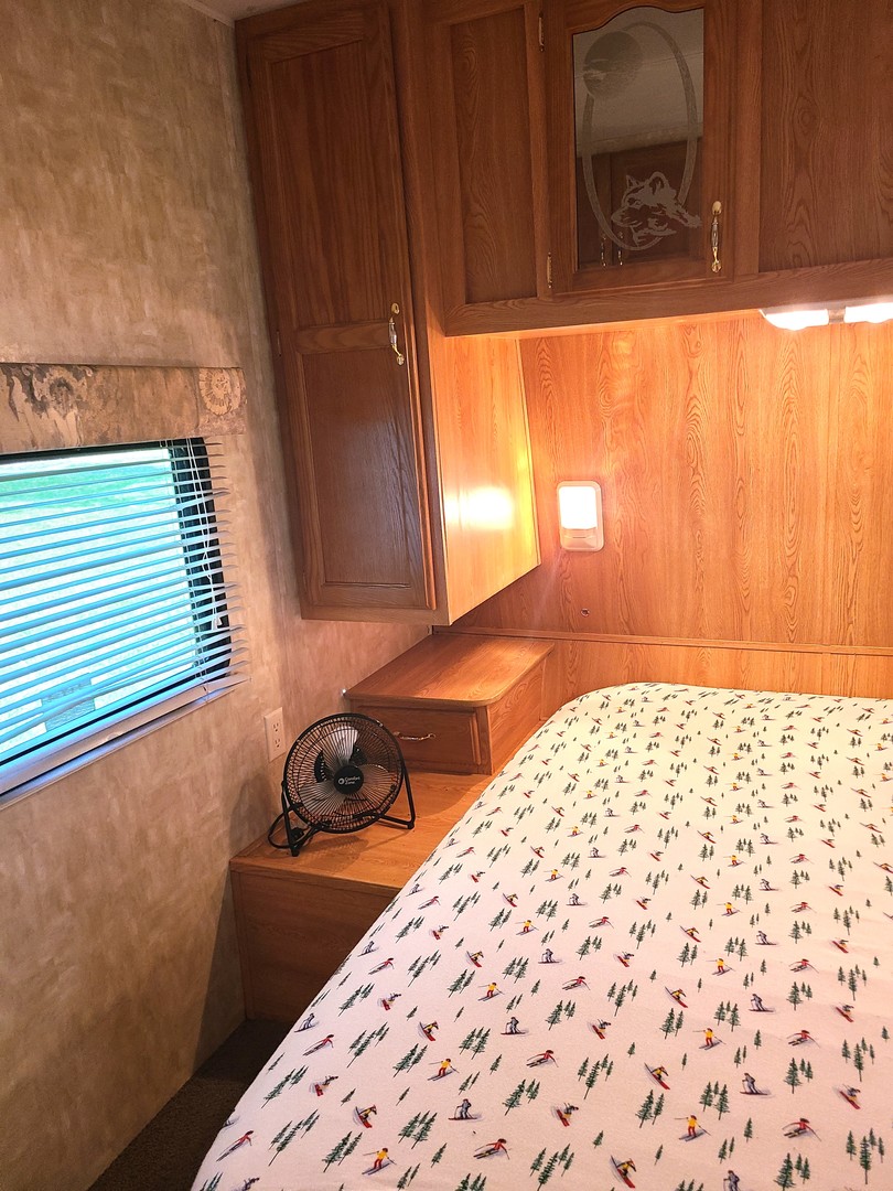17-163 Woodhaven Sublette, IL 61367 - Photo 16 of 22 a bedroom with a bed and a window