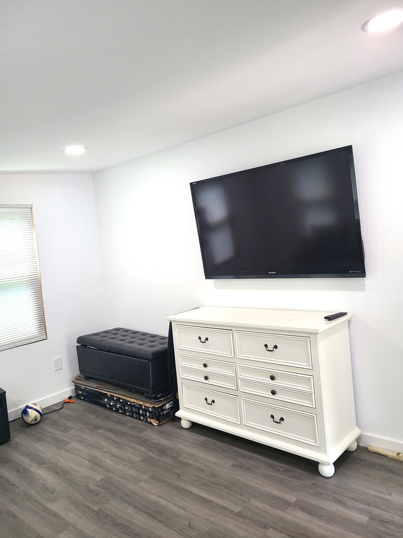 17-163 Woodhaven Sublette, IL 61367 - Photo 20 of 22 a living room with furniture and a flat screen tv