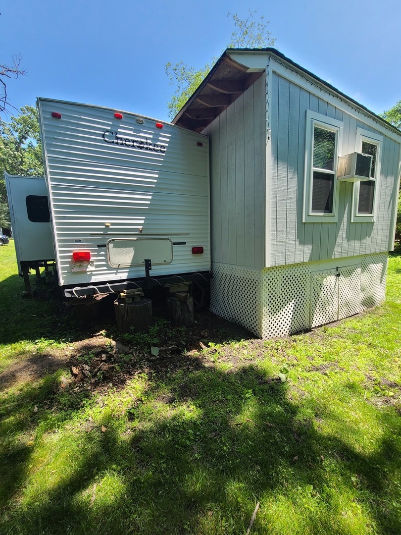 17-163 Woodhaven Sublette, IL 61367 - Photo 6 of 22 a backyard of a house