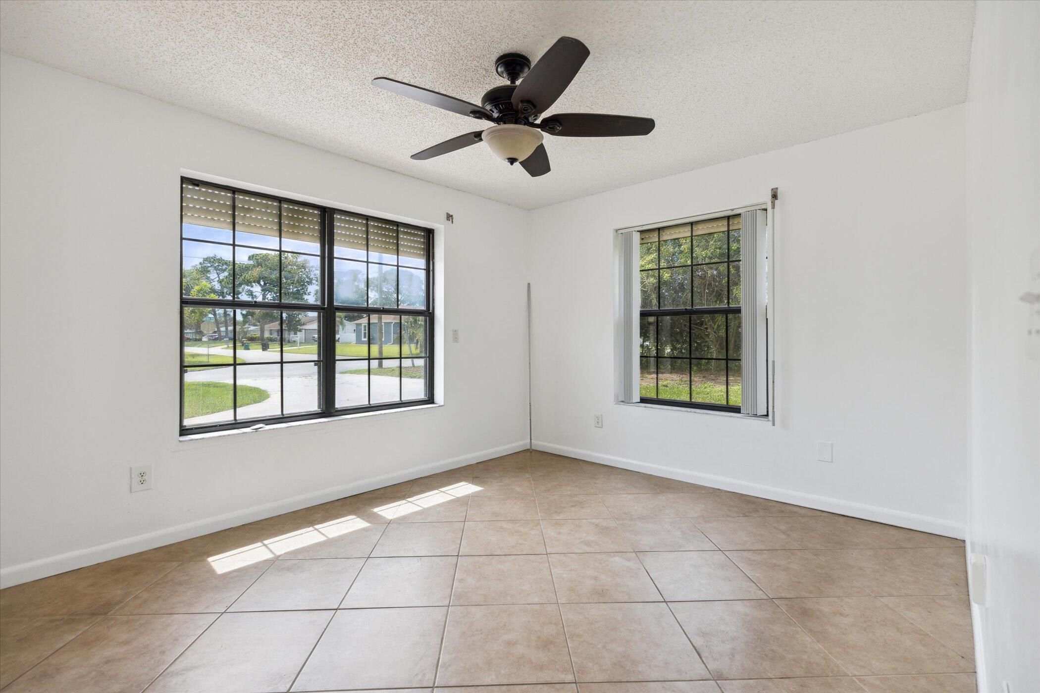 1045 Garden Road Merritt Island, FL 32952 - Photo 24 of 37 a view of an empty room with a window