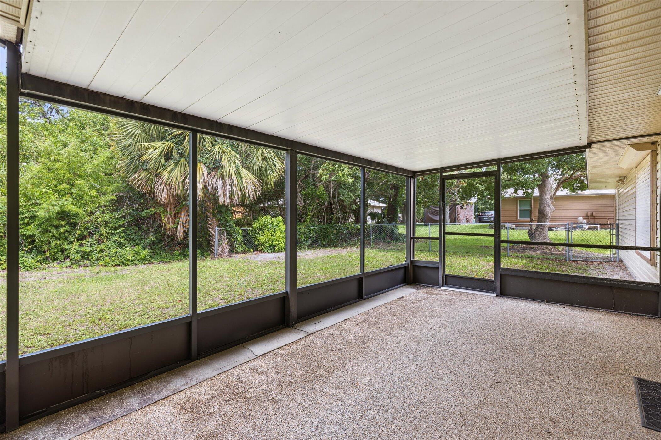 1045 Garden Road Merritt Island, FL 32952 - Photo 31 of 37 a view of a garden with an outdoor seating