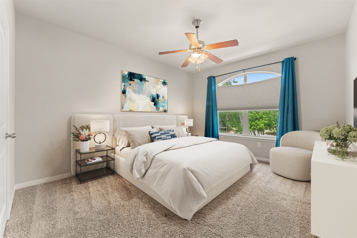 7709 Menchaca Road, Unit 5 Austin, TX 78745 - Photo 11 of 21 a bedroom with a bed and a window