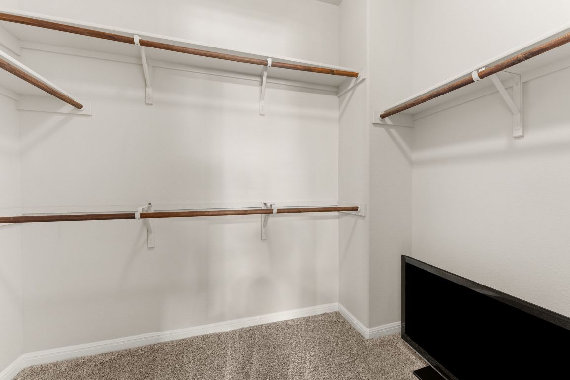 7709 Menchaca Road, Unit 5 Austin, TX 78745 - Photo 14 of 21 a view of a walk in closet