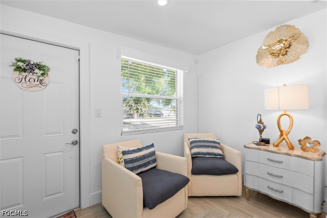 1200 Patterson Road Cape Coral, FL 33909 - Photo 26 of 42 a bedroom with furniture and a window