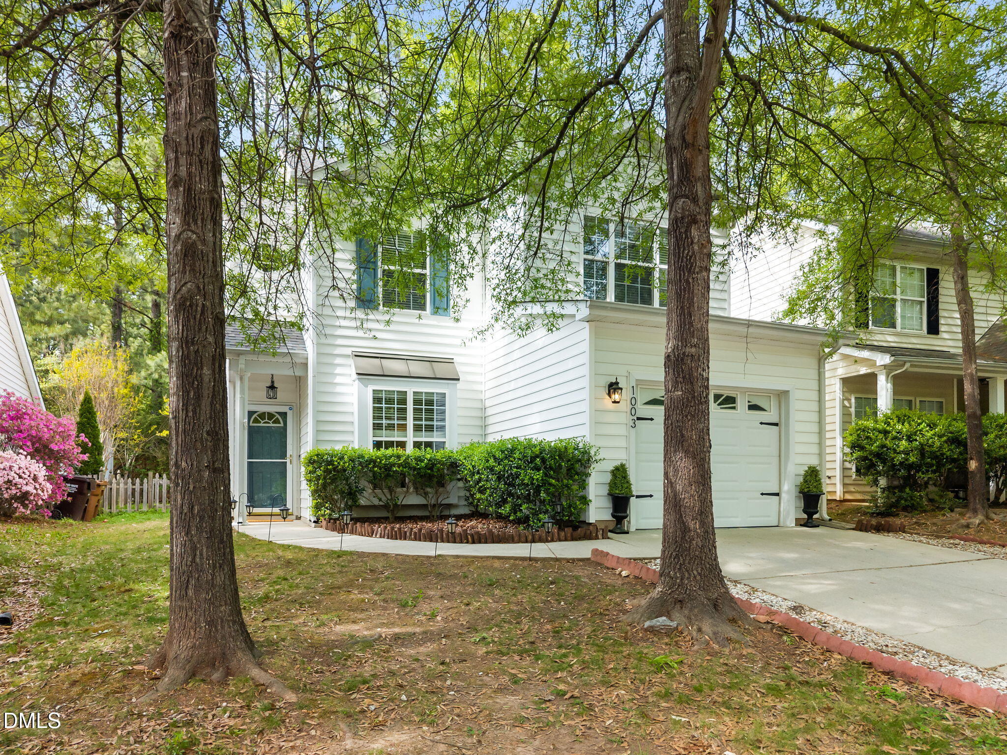 1003 Red Hat Lane Durham, NC 27713 - Photo 49 of 60 a front view of a house with garden