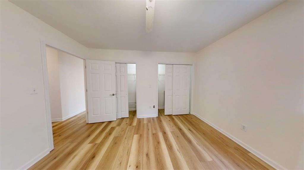 300 Johnson Ferry Road, Unit A312 Atlanta, GA 30328 - Photo 16 of 31 a view of a room with wooden floor and bathroom