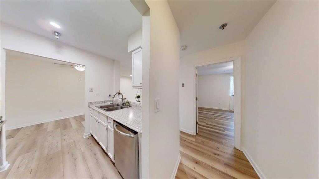 300 Johnson Ferry Road, Unit A312 Atlanta, GA 30328 - Photo 23 of 31 a bathroom with a sink and a mirror
