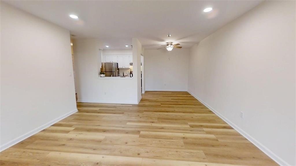 300 Johnson Ferry Road, Unit A312 Atlanta, GA 30328 - Photo 29 of 31 a view of empty room with wooden floor