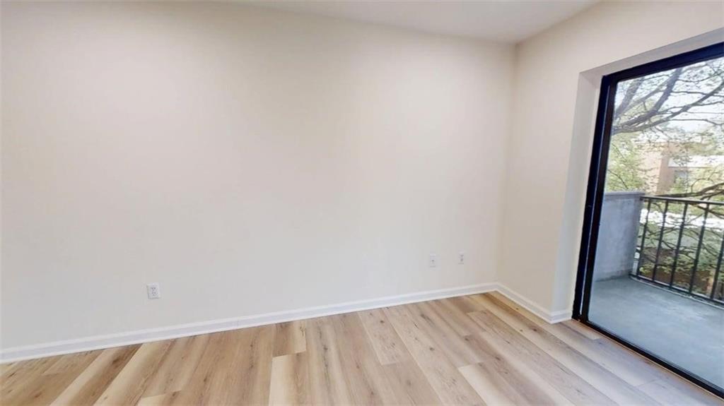 300 Johnson Ferry Road, Unit A312 Atlanta, GA 30328 - Photo 31 of 31 a view of an empty room and window