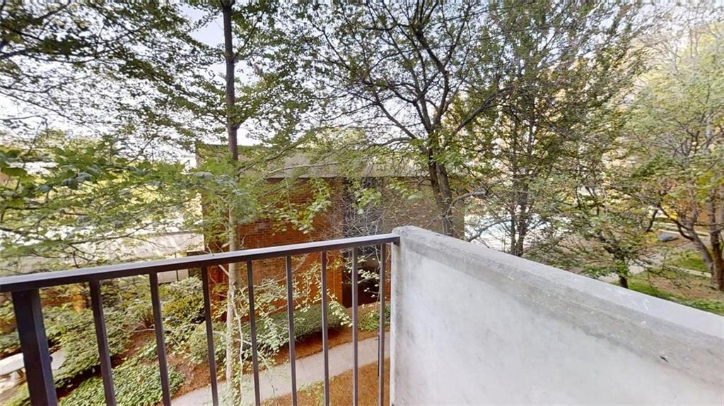 300 Johnson Ferry Road, Unit A312 Atlanta, GA 30328 - Photo 5 of 31 a view of balcony and trees