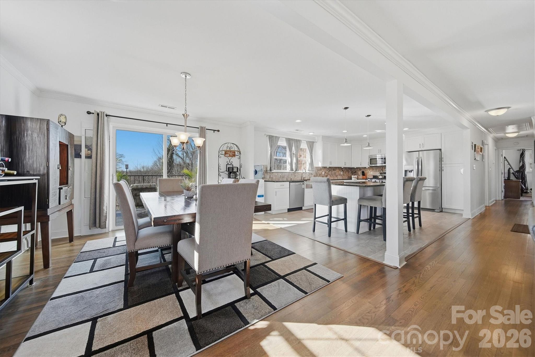 6719 Lakeview Terrace Hickory, NC 28601 - Photo 11 of 41 a dining room with furniture and wooden floor