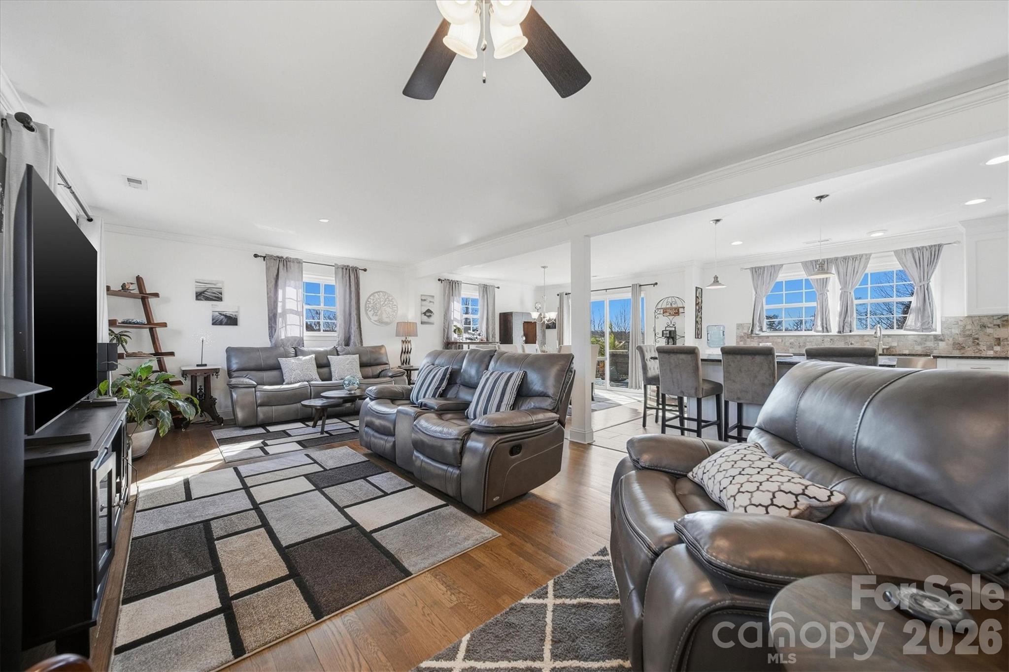 6719 Lakeview Terrace Hickory, NC 28601 - Photo 14 of 41 a living room with furniture kitchen view and a flat screen tv