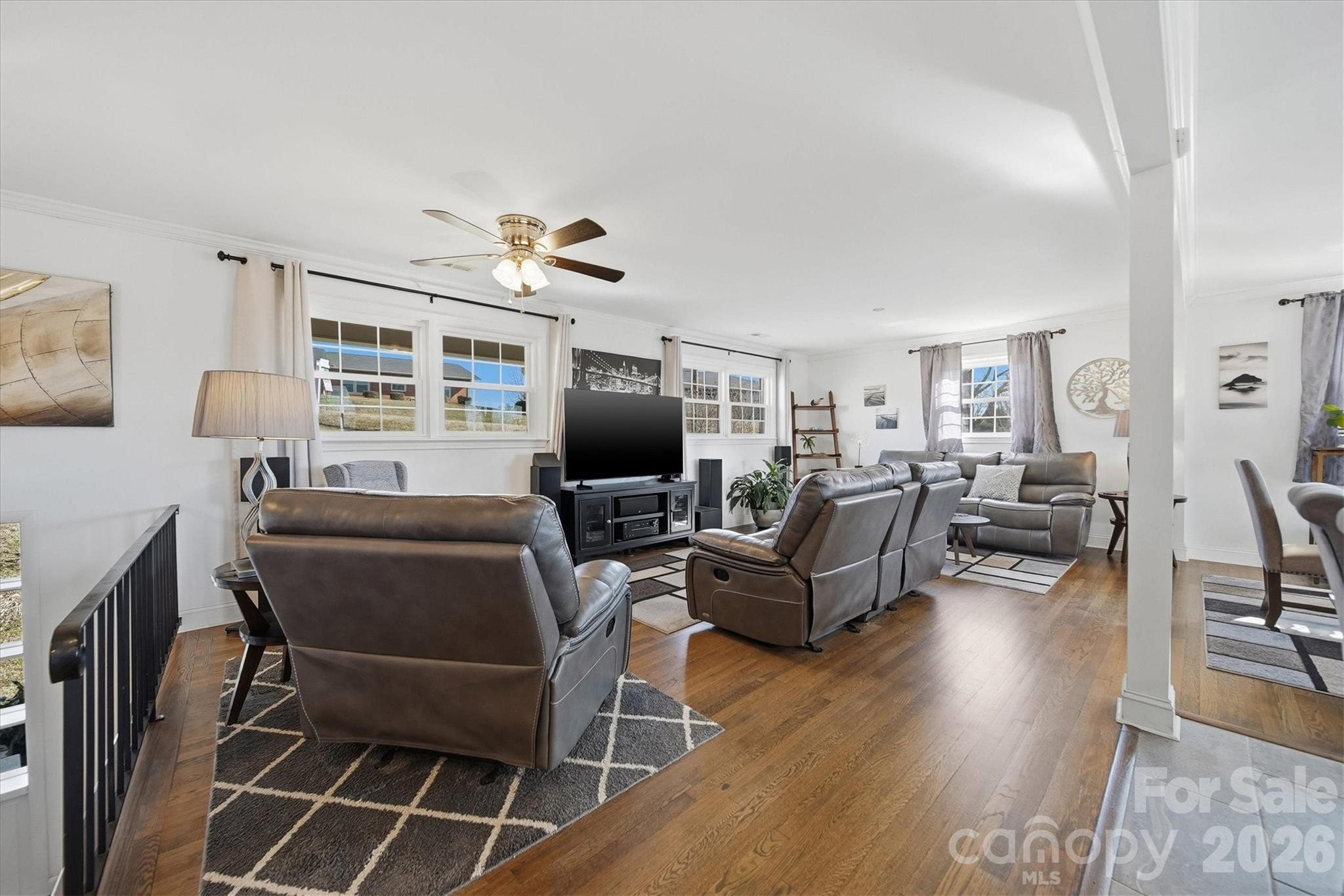 6719 Lakeview Terrace Hickory, NC 28601 - Photo 15 of 41 a living room with furniture and a flat screen tv