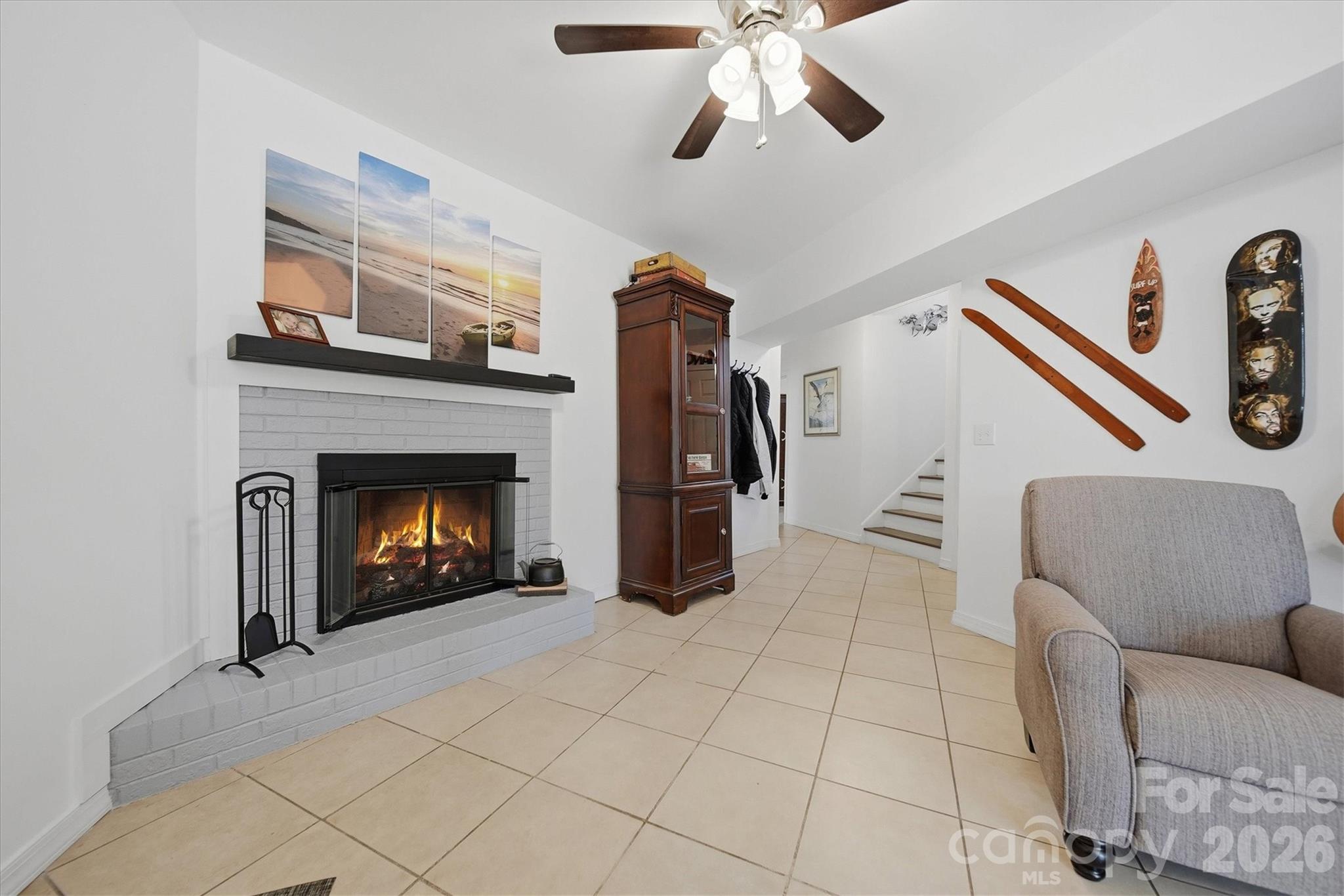 6719 Lakeview Terrace Hickory, NC 28601 - Photo 25 of 41 a living room with furniture and a fireplace