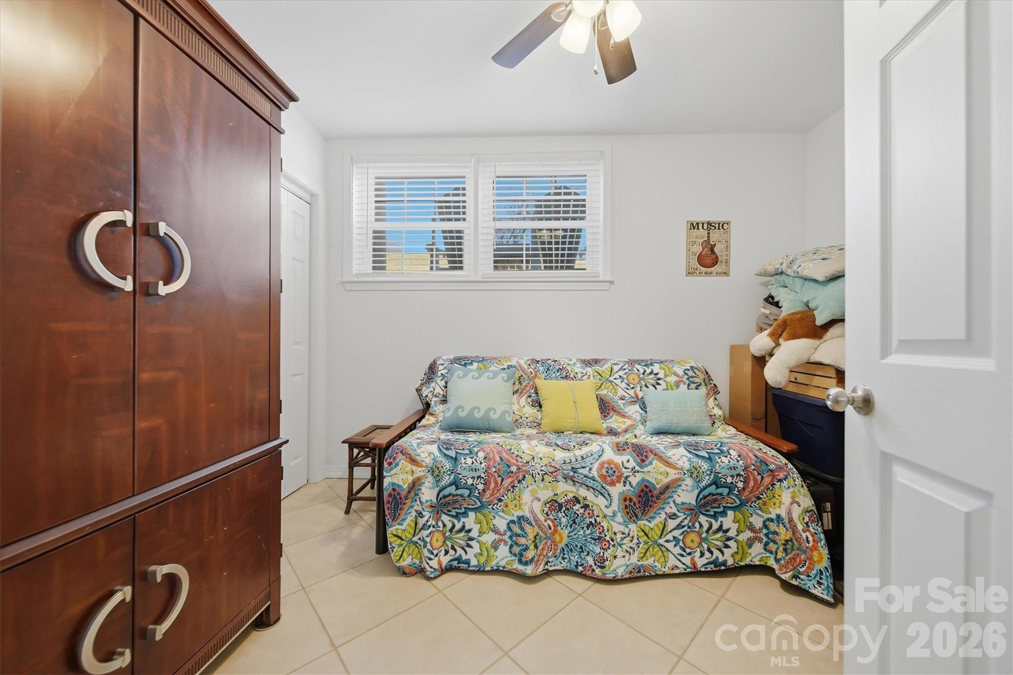 6719 Lakeview Terrace Hickory, NC 28601 - Photo 30 of 41 a bedroom with a bed and dresser