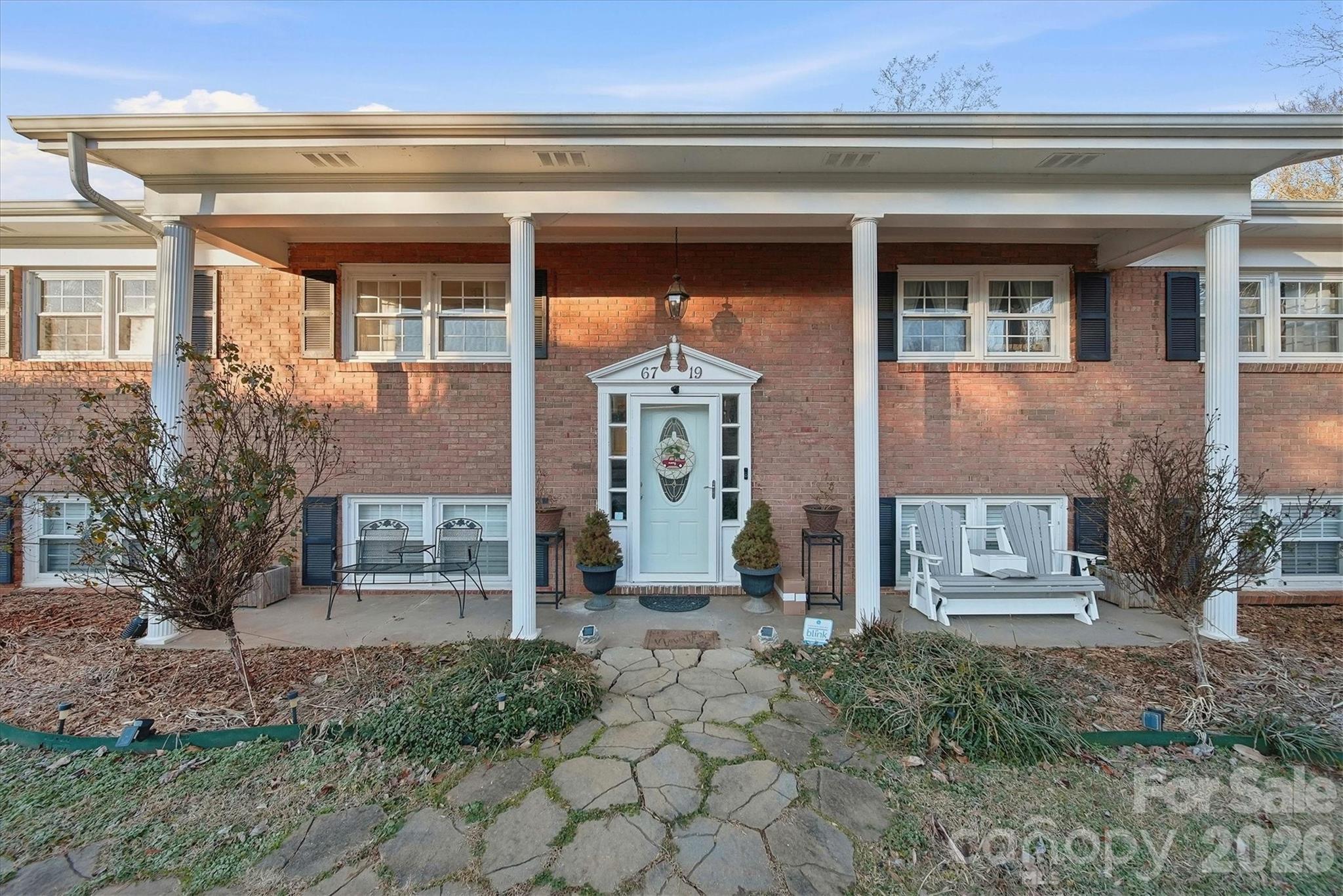 6719 Lakeview Terrace Hickory, NC 28601 - Photo 34 of 41 a front view of a house with garden