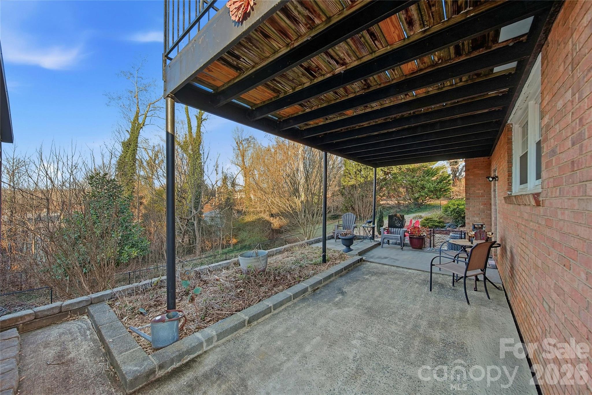 6719 Lakeview Terrace Hickory, NC 28601 - Photo 38 of 41 a view of sitting area in the backyard of a house