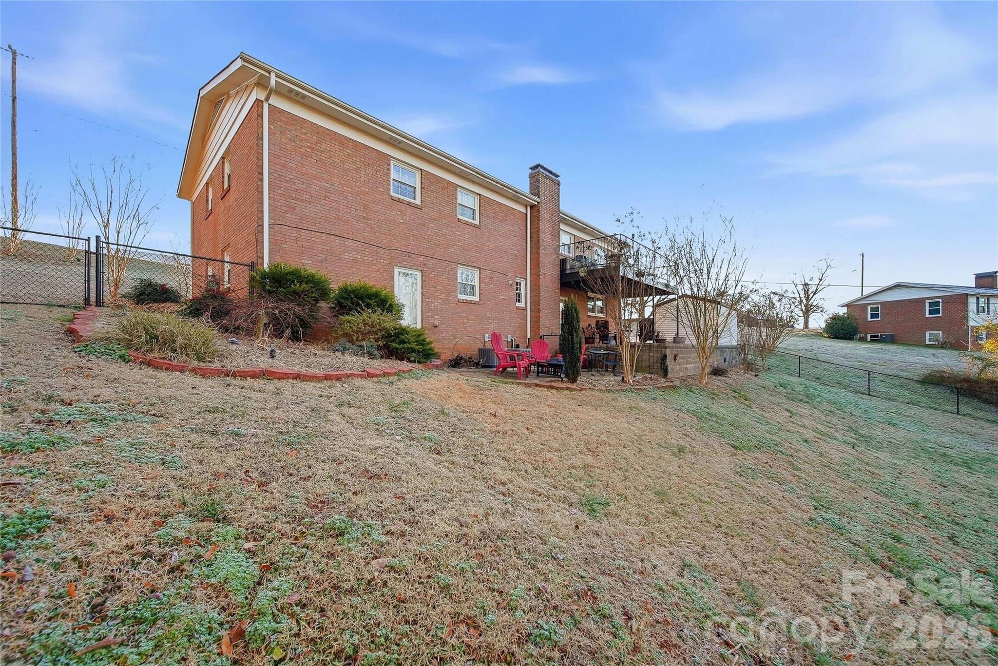 6719 Lakeview Terrace Hickory, NC 28601 - Photo 40 of 41 a view of a house with a backyard