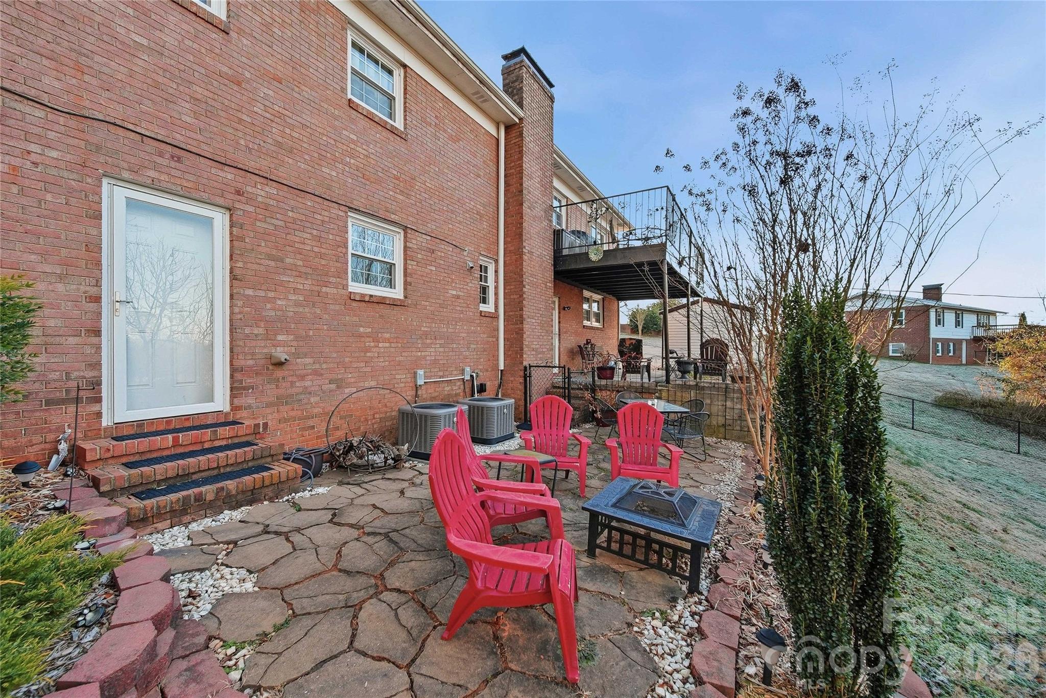 6719 Lakeview Terrace Hickory, NC 28601 - Photo 41 of 41 a backyard of a house with outdoor seating