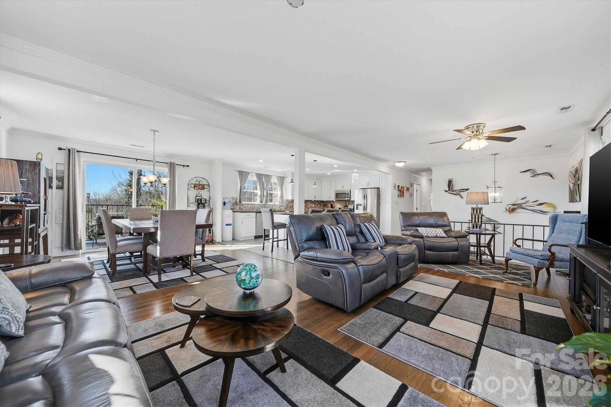 6719 Lakeview Terrace Hickory, NC 28601 - Photo 10 of 41 a living room with lots of furniture and a view of kitchen