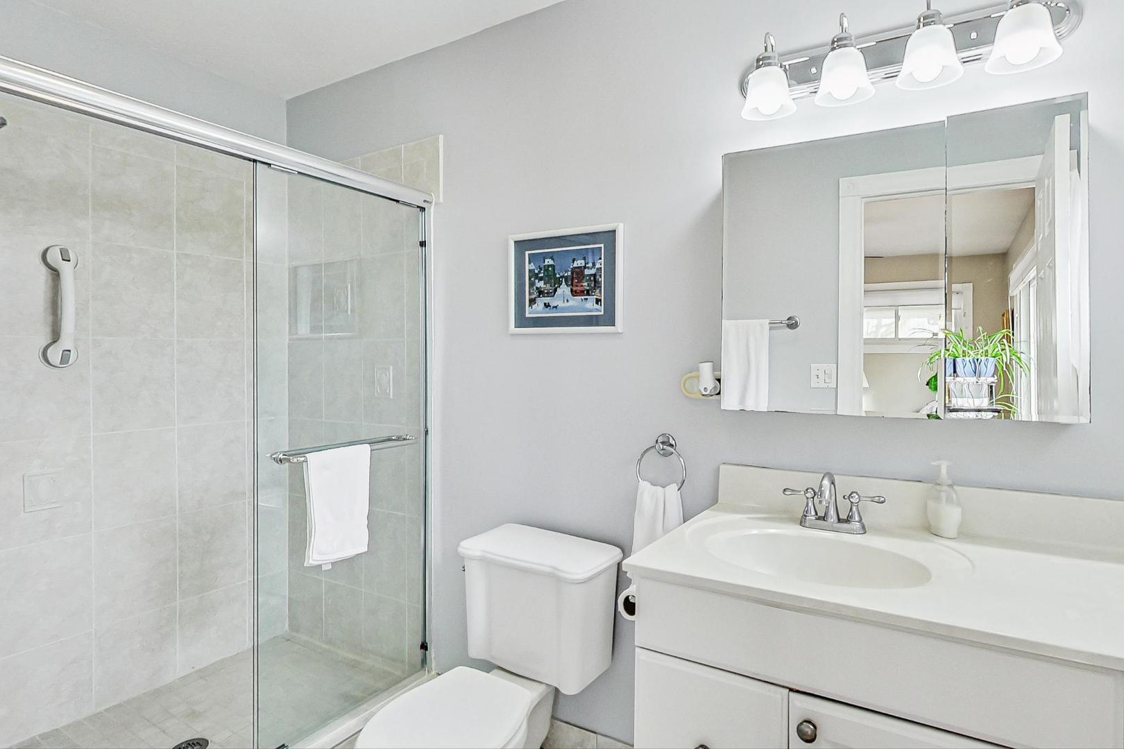 1016 Midway Road Northbrook, IL 60062 - Photo 11 of 27 a bathroom with a sink toilet and shower