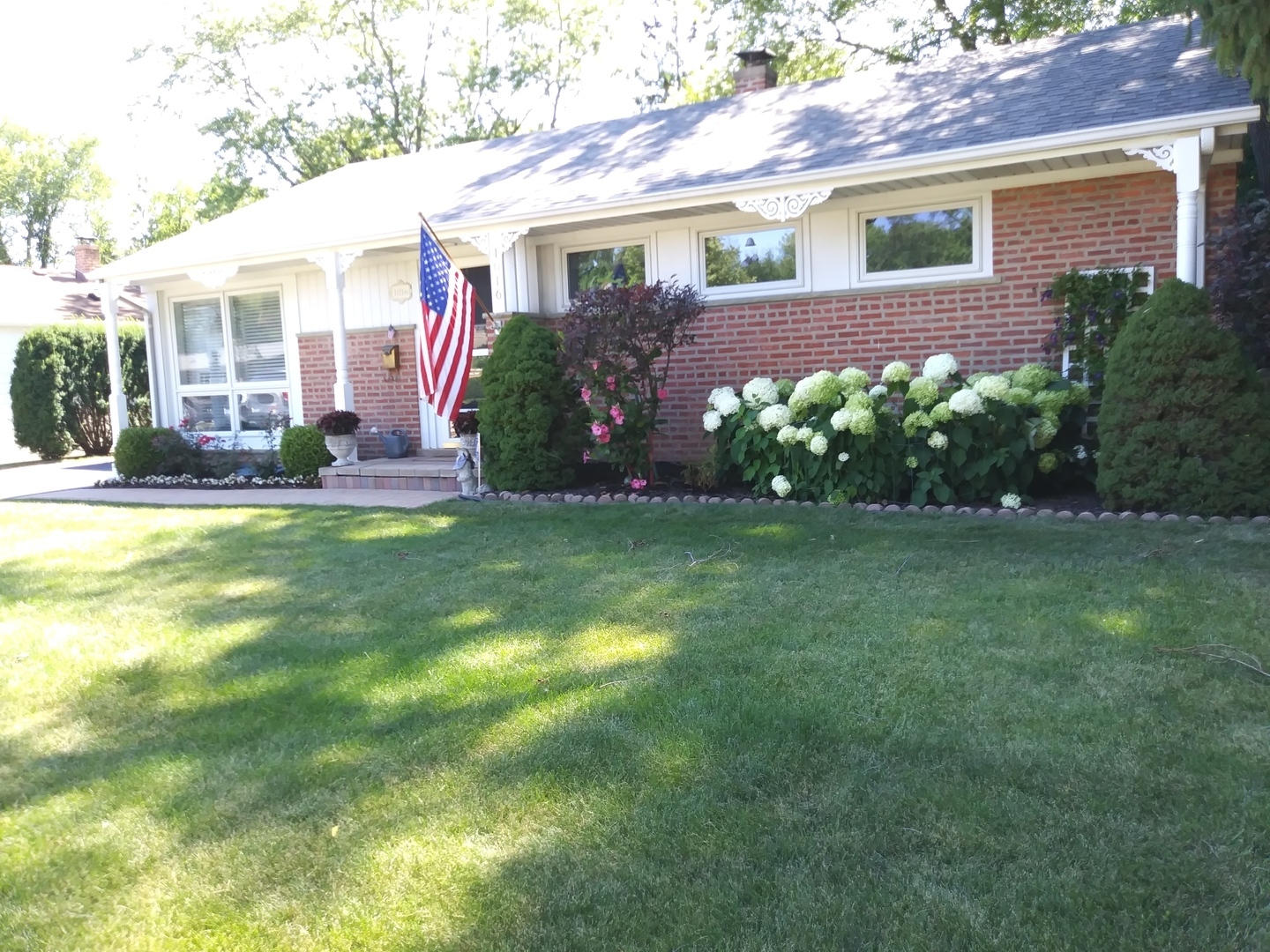 1016 Midway Road Northbrook, IL 60062 - Photo 24 of 27 a front view of a house with a yard